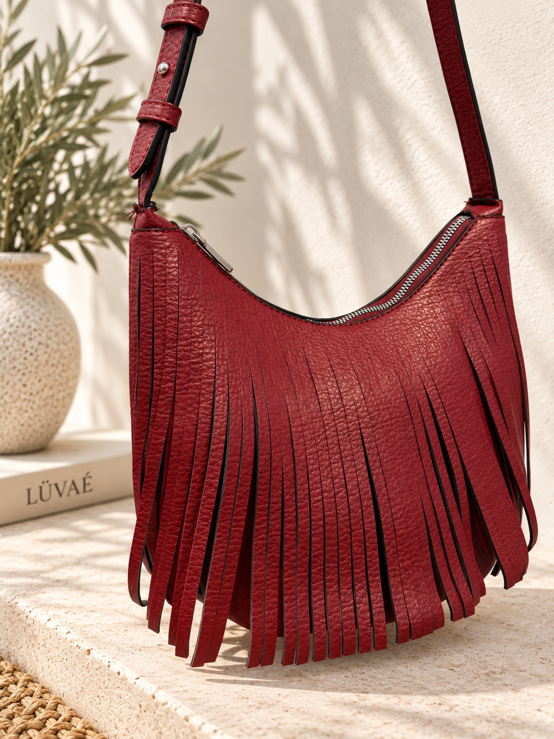BOLSO BANDOLERA CON FLECOS