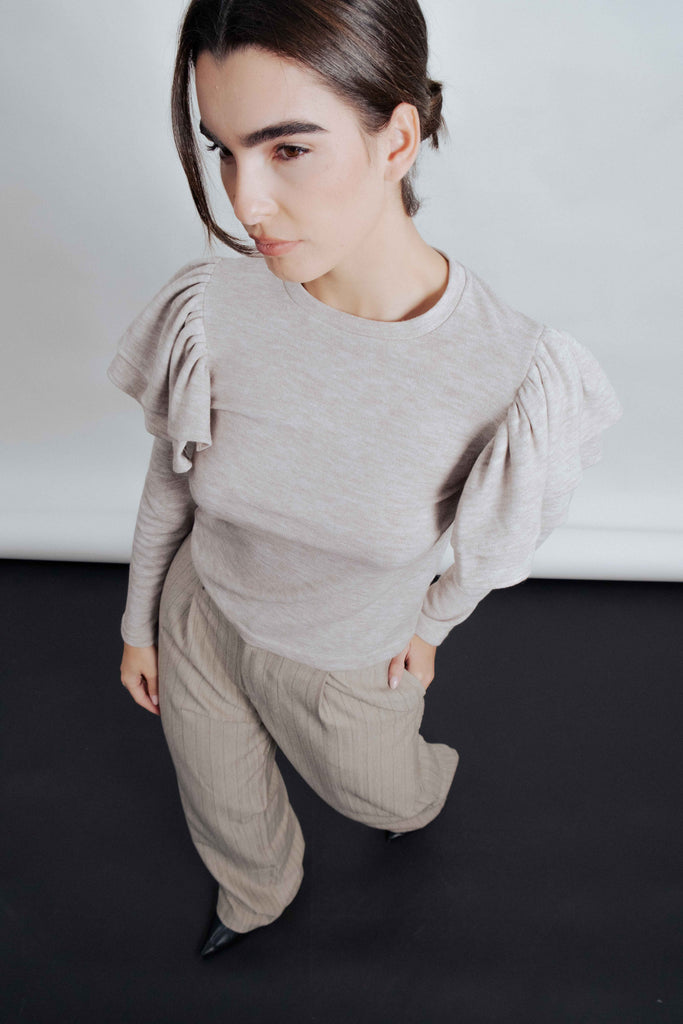 Jersey de punto con volantes