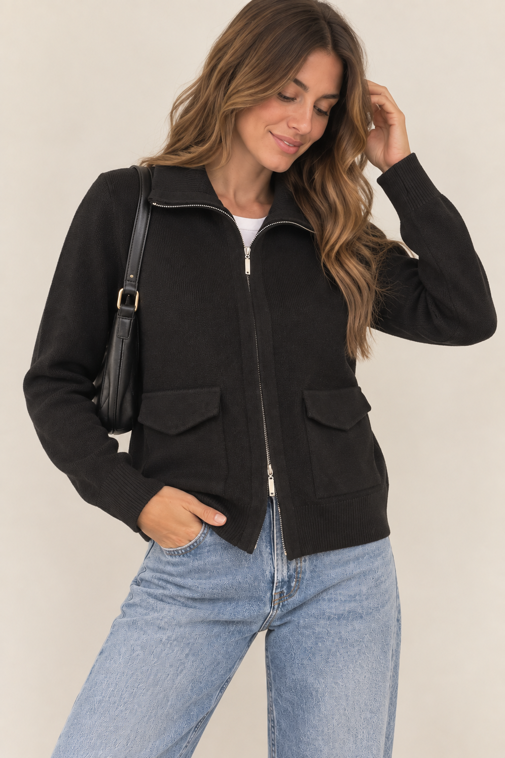 CHAQUETA DE PUNTO CON CREMALLERA