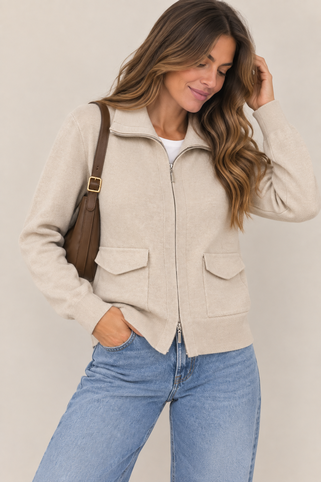 CHAQUETA DE PUNTO CON CREMALLERA