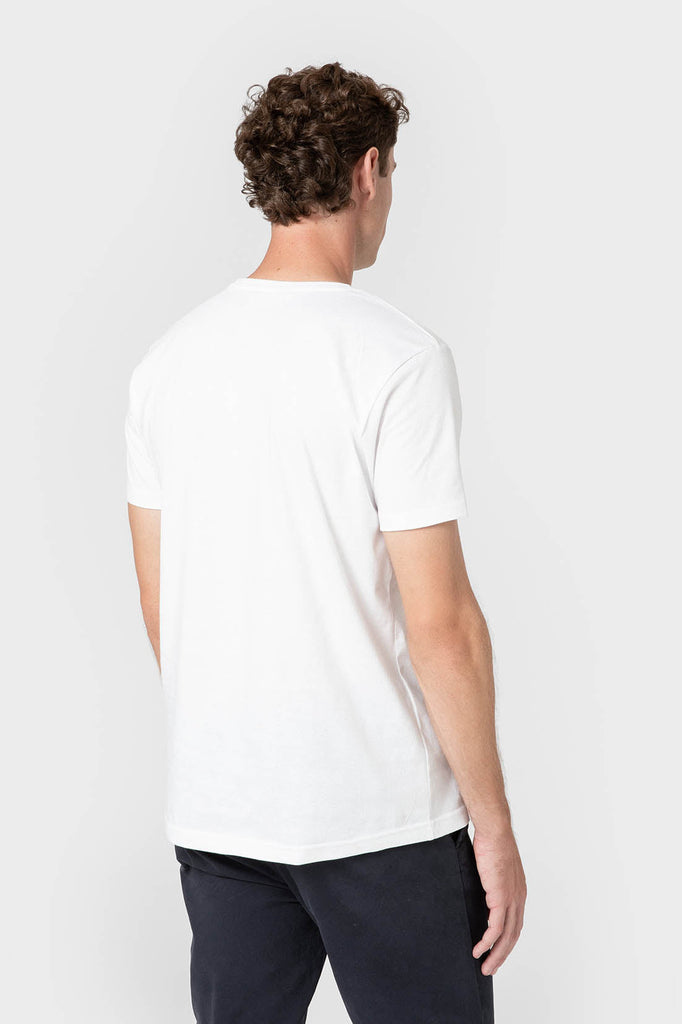 CAMISETA BÁSICA BLANCA CON GLOBO VERDE